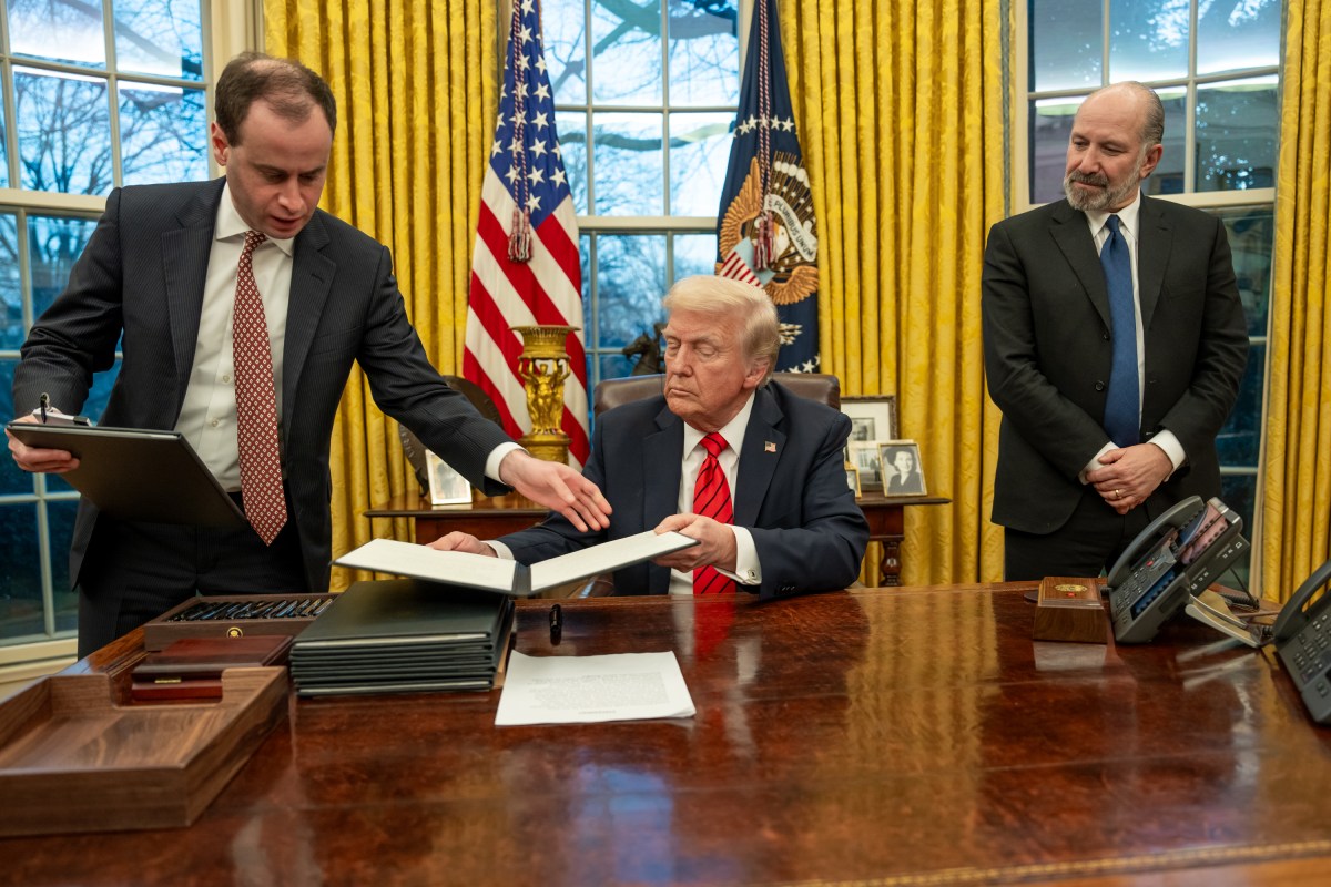 President Donald Trump signs Executive Orders, Monday, February 10, 2025, in the Oval Office. (Official White House photo by Abe McNatt)